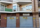 Local comercial en venta con 210m² en Onteniente, Calle Músico E. Casanova foto