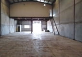 597m² warehouse industrial for sale in Alcalá del Río, A-8006 photo
