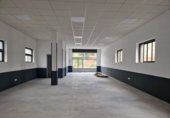 Local comercial en alquiler con 138m² en San Miguel de la Barreda, Lugar POLIGONO DE GRANDA (LA ROZA) foto