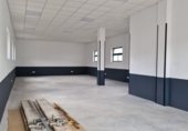 Local comercial en alquiler con 138m² en San Miguel de la Barreda, Lugar POLIGONO DE GRANDA (LA ROZA) foto