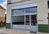 Local comercial en alquiler con 138m² en San Miguel de la Barreda, Lugar POLIGONO DE GRANDA (LA ROZA) foto
