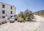 1069m² bâtiment industriel pour vente à Pórtugos, photo