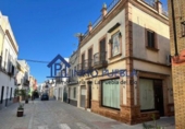 Local comercial en venta con 65m² en La Puebla del Río, Calle COMERCIO, 43 foto