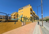 Local comercial en venta con 108m² en Atarfe, Calle del Tercio foto